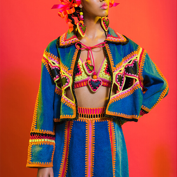 Colorful Sustainable Knit Garments Styled on Ethnic Model